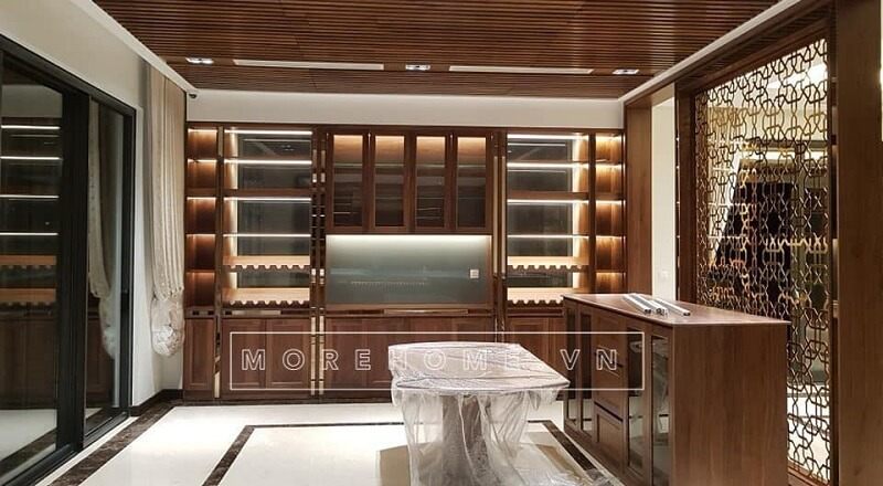 Thi công tủ bếp gỗ óc chó cao cấp với đường nét tinh tế, mang đến không gian phòng bếp lí tưởng